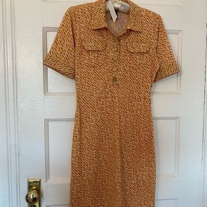 Vintage short sleeve dress. Gorgeous burnt orange/white pattern, brass buttons.